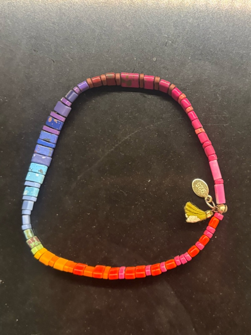SHASHI Multicolor Rainbow Beaded Bracelet with Gold Tassel Charm